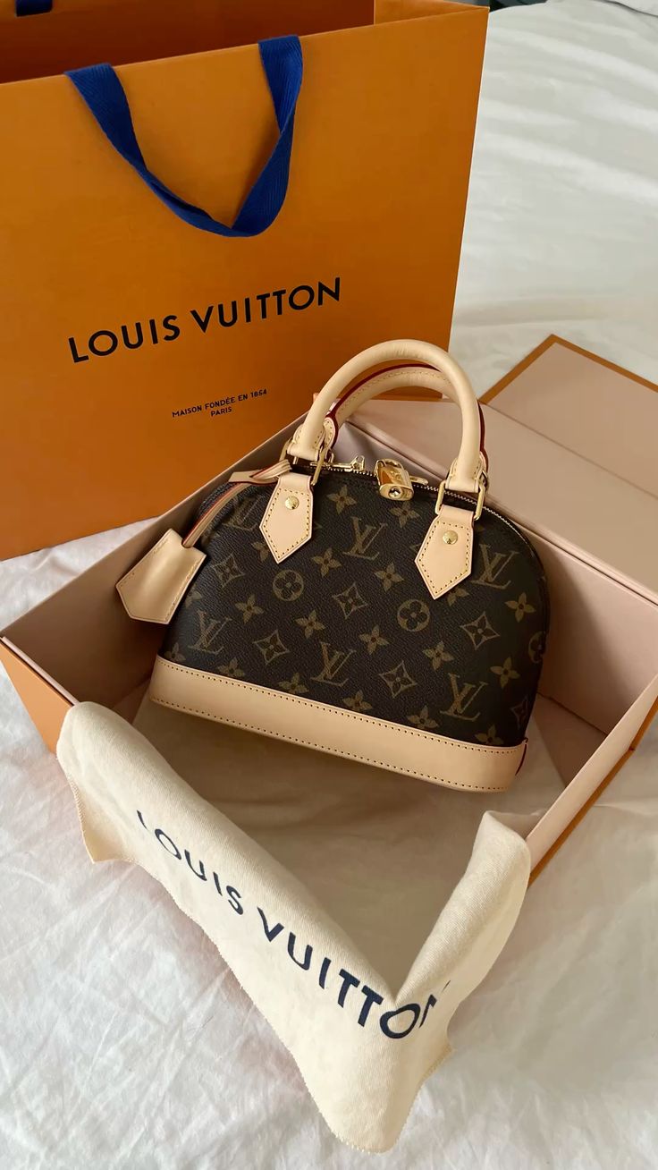 Louis Vuitton Alma BB Handbag (Beige Handles)