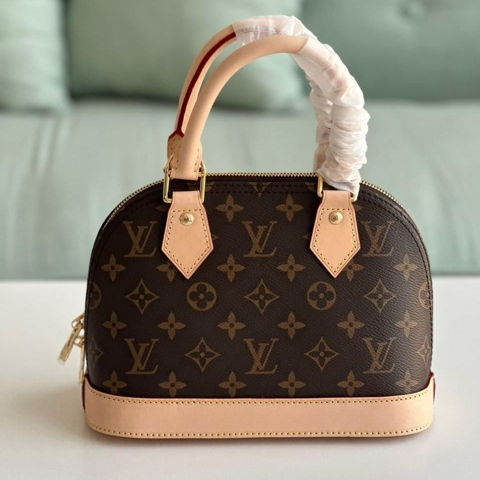 Louis Vuitton Alma BB Handbag (Beige Handles)
