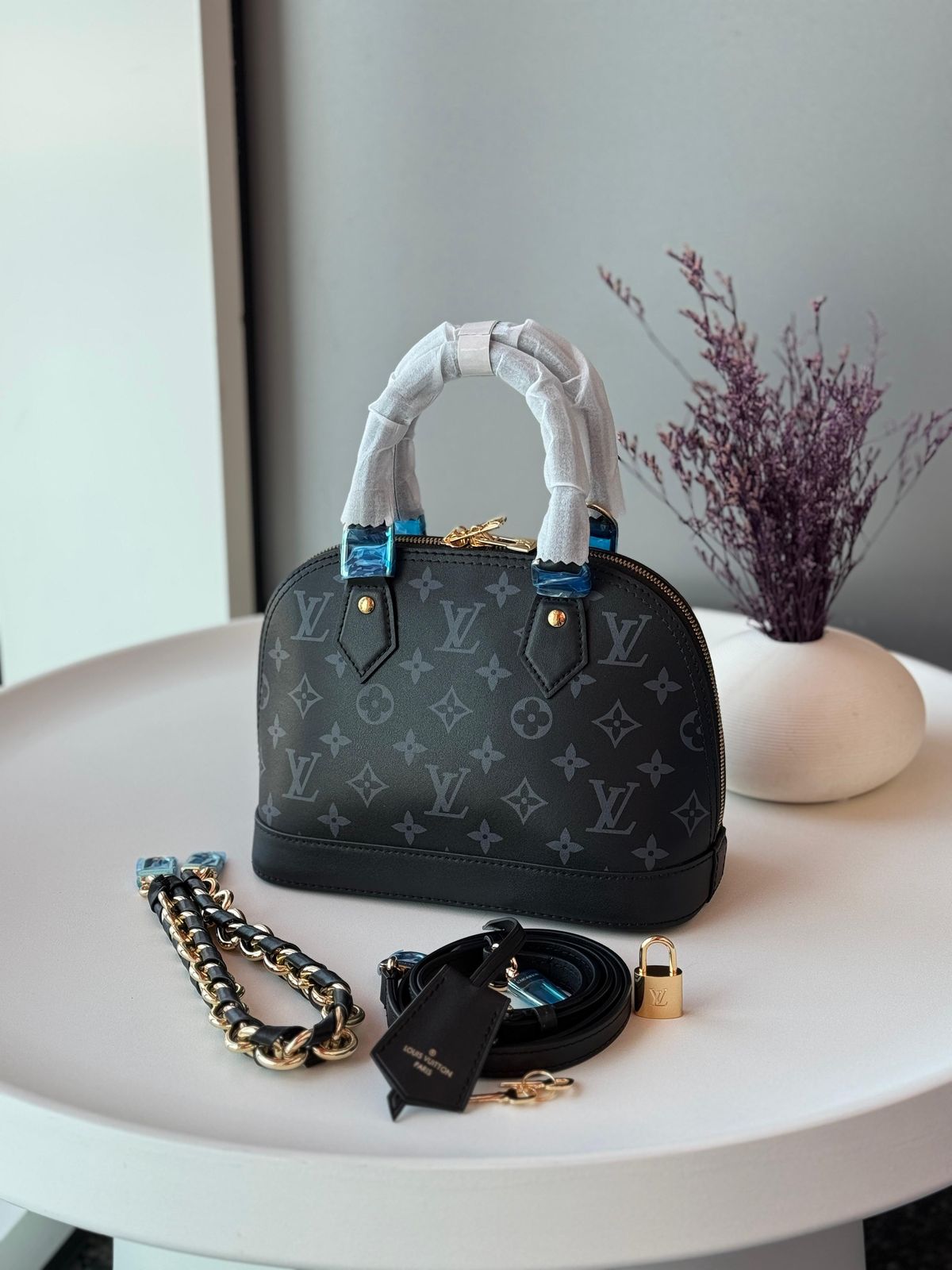 Louis Vuitton Alma BB Handbag (Black)